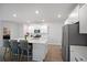 Modern kitchen with a spacious island, stainless steel appliances, and open floor plan at 1115 Fitzgerald Ct, Summerville, SC 29485