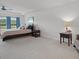 Spacious carpeted main bedroom, with a tray ceiling and a sitting area at 1115 Fitzgerald Ct, Summerville, SC 29485