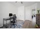 Office with desk, chair, and view into dining room, adjacent to multiple closets and doorways at 1115 Fitzgerald Ct, Summerville, SC 29485