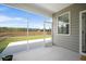 Bright screened porch with backyard views, connecting indoor-outdoor living spaces seamlessly at 1115 Fitzgerald Ct, Summerville, SC 29485