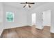 A bright bedroom with hardwood flooring, a ceiling fan, and freshly painted walls at 112 Southsong Ln, Goose Creek, SC 29445