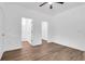 A large bedroom featuring hardwood flooring, a walk-in closet, and freshly painted walls at 112 Southsong Ln, Goose Creek, SC 29445