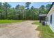Well maintained home with fresh grass and black roof situated amongst lush trees at 112 Southsong Ln, Goose Creek, SC 29445