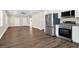 An open kitchen boasts stainless steel appliances and plenty of counter space at 112 Southsong Ln, Goose Creek, SC 29445