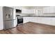 Modern kitchen with stainless steel appliances, granite countertops, and white cabinetry at 112 Southsong Ln, Goose Creek, SC 29445