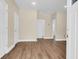 Bright living area features modern flooring, neutral walls, and ample natural light; move-in ready and waiting for personal touches at 112 Southsong Ln, Goose Creek, SC 29445
