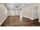 Expansive living area offers versatile layout options, modern flooring, and easy access to adjacent rooms, perfect for dynamic living at 112 Southsong Ln, Goose Creek, SC 29445