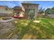 Large backyard with deck, firepit, and patio space at 120 Apache Dr, Summerville, SC 29483