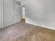Cozy bedroom with neutral carpeting and a view into the hallway at 120 Apache Dr, Summerville, SC 29483