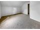 Attic bedroom features neutral carpet and white door at 120 Apache Dr, Summerville, SC 29483