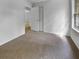 Empty bedroom features neutral carpet and two doors at 120 Apache Dr, Summerville, SC 29483