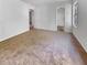 Large bedroom with neutral carpet and easy access to the bathroom at 120 Apache Dr, Summerville, SC 29483