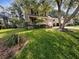 Charming two-story home with a well-manicured lawn and mature trees at 120 Apache Dr, Summerville, SC 29483