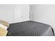 A simple bedroom design with a minimal window and a comfortable bed with decorative pillows at 120 Haverhill St, Summerville, SC 29486