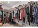 Spacious walk-in closet with extensive shelving and hanging space for organized storage of clothing and shoes at 120 Haverhill St, Summerville, SC 29486