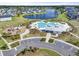 Beautiful community pool with ample lounge seating, playground, parking, and lush landscaping at 120 Haverhill St, Summerville, SC 29486