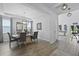 Charming dining room with hardwood floors, chandelier lighting, and seating for six at 120 Haverhill St, Summerville, SC 29486