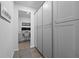 Hallway features a pantry, cabinets and a workspace for functionality at 120 Haverhill St, Summerville, SC 29486