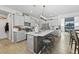 Bright kitchen with an island, stainless steel appliances, and wood flooring at 120 Haverhill St, Summerville, SC 29486