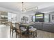 Open-concept living space with hardwood floors, modern lighting, and stylish decor at 120 Haverhill St, Summerville, SC 29486