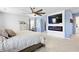 Inviting main bedroom with an electric fireplace, modern television, and lots of natural light at 120 Haverhill St, Summerville, SC 29486