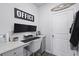 Bright home office with built-in desk, chair, and ample natural light at 120 Haverhill St, Summerville, SC 29486