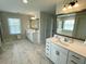 Bathroom featuring double sink vanities and elegant tile flooring at 122 Riley Farms Ct, Summerville, SC 29486