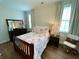 Bedroom featuring a cozy bed, natural lighting, and classic furnishings at 122 Riley Farms Ct, Summerville, SC 29486