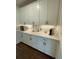 Kitchen with custom cabinets, modern appliances, and white countertops at 122 Riley Farms Ct, Summerville, SC 29486