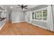 Inviting living room featuring hardwood floors, large windows, and an open design at 1248 Sumner Ave, North Charleston, SC 29406