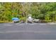 Community boat parking with multiple boat slips amidst lush greenery and mature trees at 1300 Park West Blvd # 512, Mount Pleasant, SC 29466