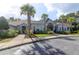 Beautiful clubhouse featuring lush landscaping, offering a welcoming space for community gatherings and events at 1300 Park West Blvd # 512, Mount Pleasant, SC 29466