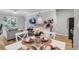 Inviting dining area with seating for four and open-concept layout connected to the living room at 1300 Park West Blvd # 512, Mount Pleasant, SC 29466