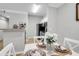 Well-lit dining and kitchen area featuring modern appliances, a breakfast bar and seating for four at 1300 Park West Blvd # 512, Mount Pleasant, SC 29466