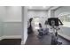 Fitness area with a variety of cardio machines and ample natural light at 1300 Park West Blvd # 512, Mount Pleasant, SC 29466
