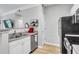 Cozy kitchen featuring modern appliances and white cabinets at 1300 Park West Blvd # 512, Mount Pleasant, SC 29466