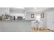 Modern kitchen features stainless steel appliances, white cabinets, and a convenient breakfast bar at 1300 Park West Blvd # 512, Mount Pleasant, SC 29466