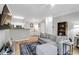 Spacious living room with wood floors and a view of the kitchen and dining area at 1300 Park West Blvd # 512, Mount Pleasant, SC 29466