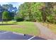 Scenic park with green space, picnic table, and walking path, ideal for outdoor activities and relaxation at 1300 Park West Blvd # 512, Mount Pleasant, SC 29466