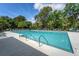 A large, inviting community swimming pool with plenty of lounge chairs for relaxation at 1308 Wild Olive Dr, Mount Pleasant, SC 29464