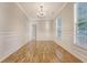 Formal dining room featuring hardwood floors, wainscoting, and a chandelier at 1308 Wild Olive Dr, Mount Pleasant, SC 29464