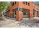 Street view of a brick restaurant building with large windows and outdoor seating, enhancing community charm at 1308 Wild Olive Dr, Mount Pleasant, SC 29464