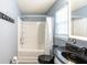 Well-lit bathroom features a tiled shower/tub combo and vanity with modern finishes at 137 Salem Creek Dr, Goose Creek, SC 29445