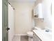 A clean bathroom features white cabinets, a vanity, an oval mirror, and a shower with curtain at 137 Salem Creek Dr, Goose Creek, SC 29445
