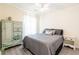 This bedroom boasts a comfortable bed, dresser, window, and modern ceiling fan at 137 Salem Creek Dr, Goose Creek, SC 29445