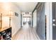 Inviting hallway with stylish barn door, decorative lamp, and views into the home at 137 Salem Creek Dr, Goose Creek, SC 29445