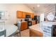 Well-lit kitchen with light wood cabinets, black appliances, and eat in space at 137 Salem Creek Dr, Goose Creek, SC 29445