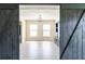 Spacious living room with light gray floors, dark wood accents, and bright light fixture at 137 Salem Creek Dr, Goose Creek, SC 29445