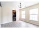 Bright living room with natural light, light gray floors, and neutral paint at 137 Salem Creek Dr, Goose Creek, SC 29445