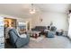 Bright living room with light-colored walls and wood floors, furnished with gray leather furniture at 137 Salem Creek Dr, Goose Creek, SC 29445